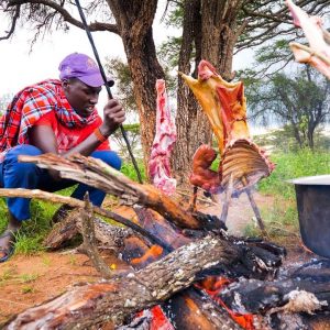 East African Food - He Gave Me The PRIZED DELICACY! [WARNING] - Goat Roast With Maasai in Kenya!