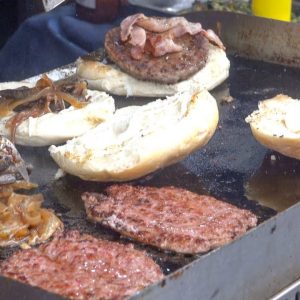 Burgers, Sausages, Steaks. Traditional Italian Beef and Meats on Grill. Street Food Festival
