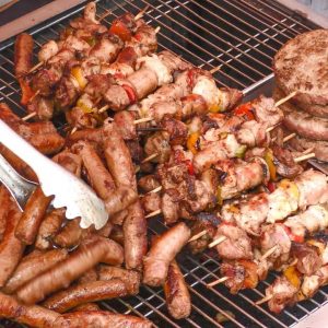 Italy Street Food. Grilling Sliced Beef, Burgers, Ribs, Sausages, Pasta, Sweets and more