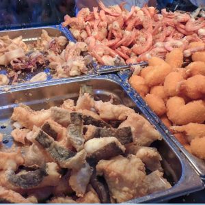Italy Street Food. Orgy of Fried Fish, Seafood, Paella
