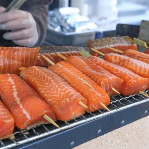 Salmon, Fish and Eggs on Grill. London Street Food