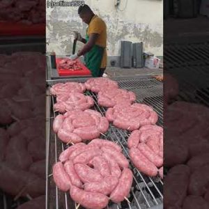 Setting up a Brazilian Grill, Sausages and Beef. Italy Street Food