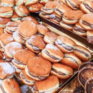 Filling up tons of Pastries with Creams. Italian Street Food Pastries from Naples